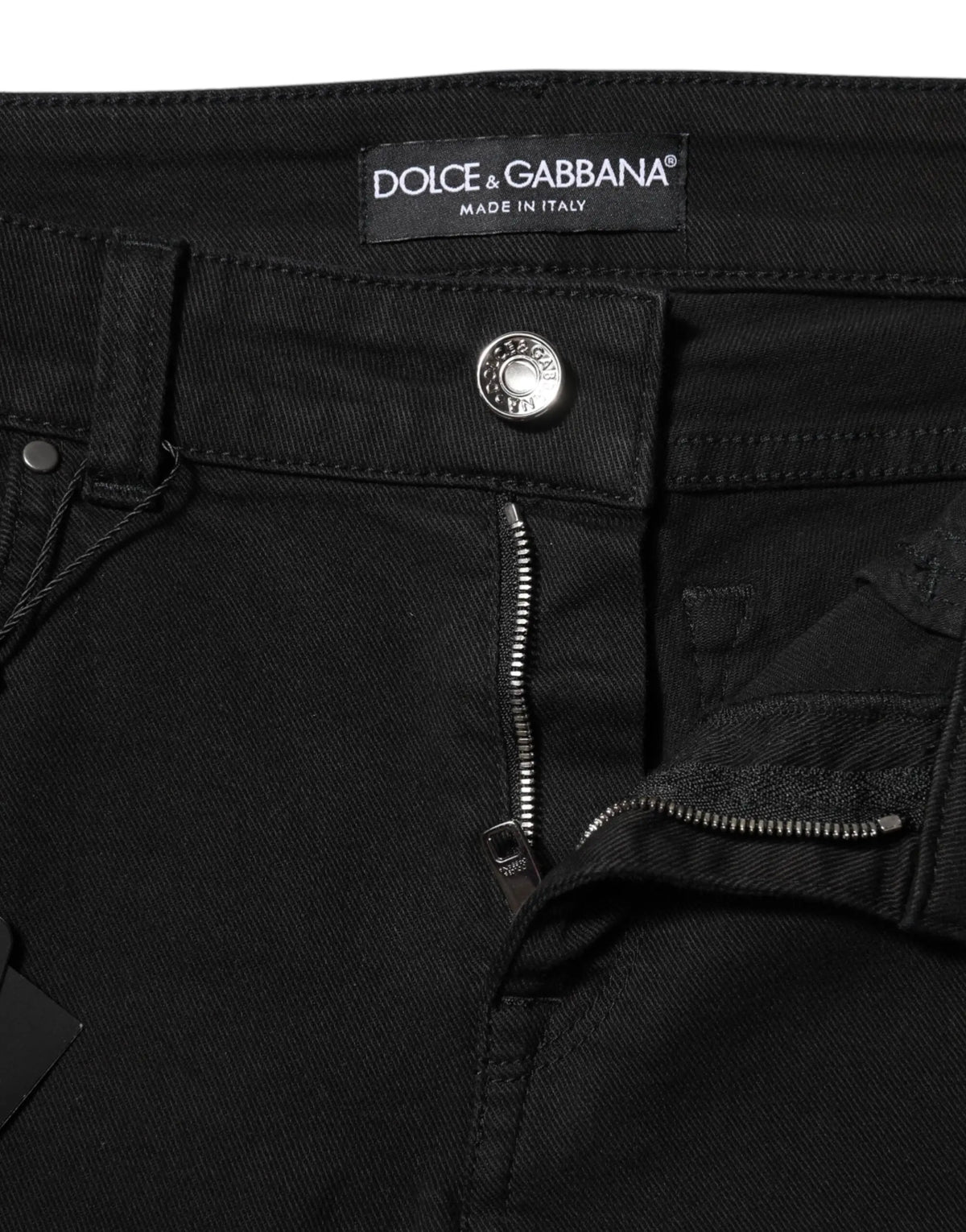 Jean skinny mi taille en denim noir en coton dolce gabbana avec bouton argenté et étiquette de marque visible