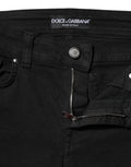 Jean denim noir dolce gabbana en coton avec étiquette logo et bouton argenté slim taille mi-haute