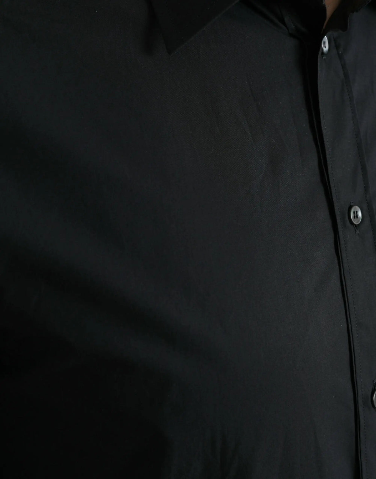 Dolce & Gabbana chemise homme formelle noire en coton avec col structuré et texture subtile pour occasions habillées