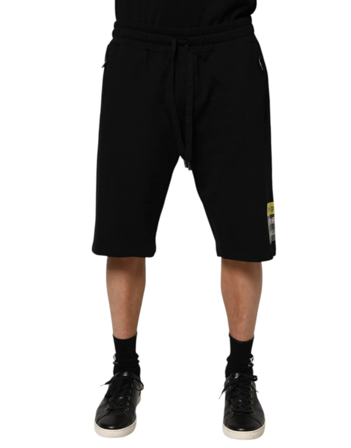 Dolce & gabbana short bermuda décontracté noir en coton avec taille mi-haute, cordon et poche latérale, étiquette jaune