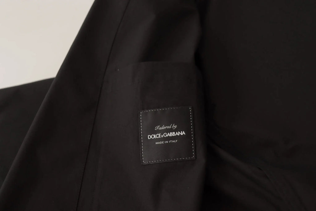 Veste noire dolce gabbana en coton avec patch en cuir cousu portant le nom de la marque et made in italy