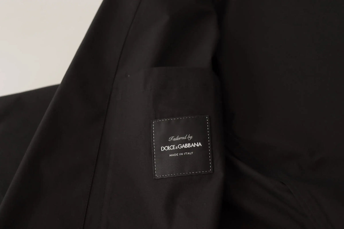 Veste noire dolce gabbana en coton avec patch en cuir cousu portant le nom de la marque et made in italy