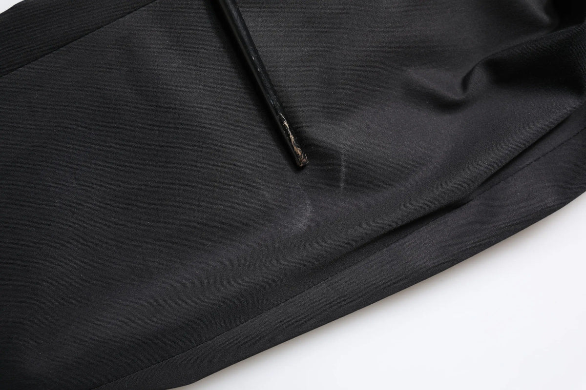 Pantalon en coton noir dolce & gabbana avec éclat subtil et couture visible sur la couture
