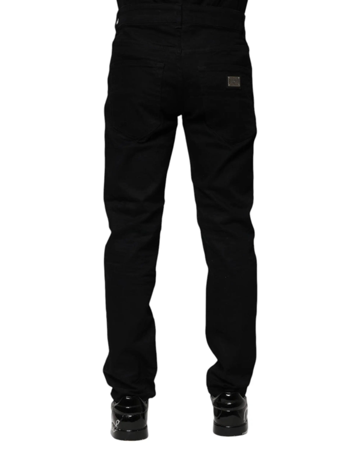 Jeans en denim noir dolce & gabbana en coton coupe skinny avec patch métallique subtil sur la poche arrière droite vue dos