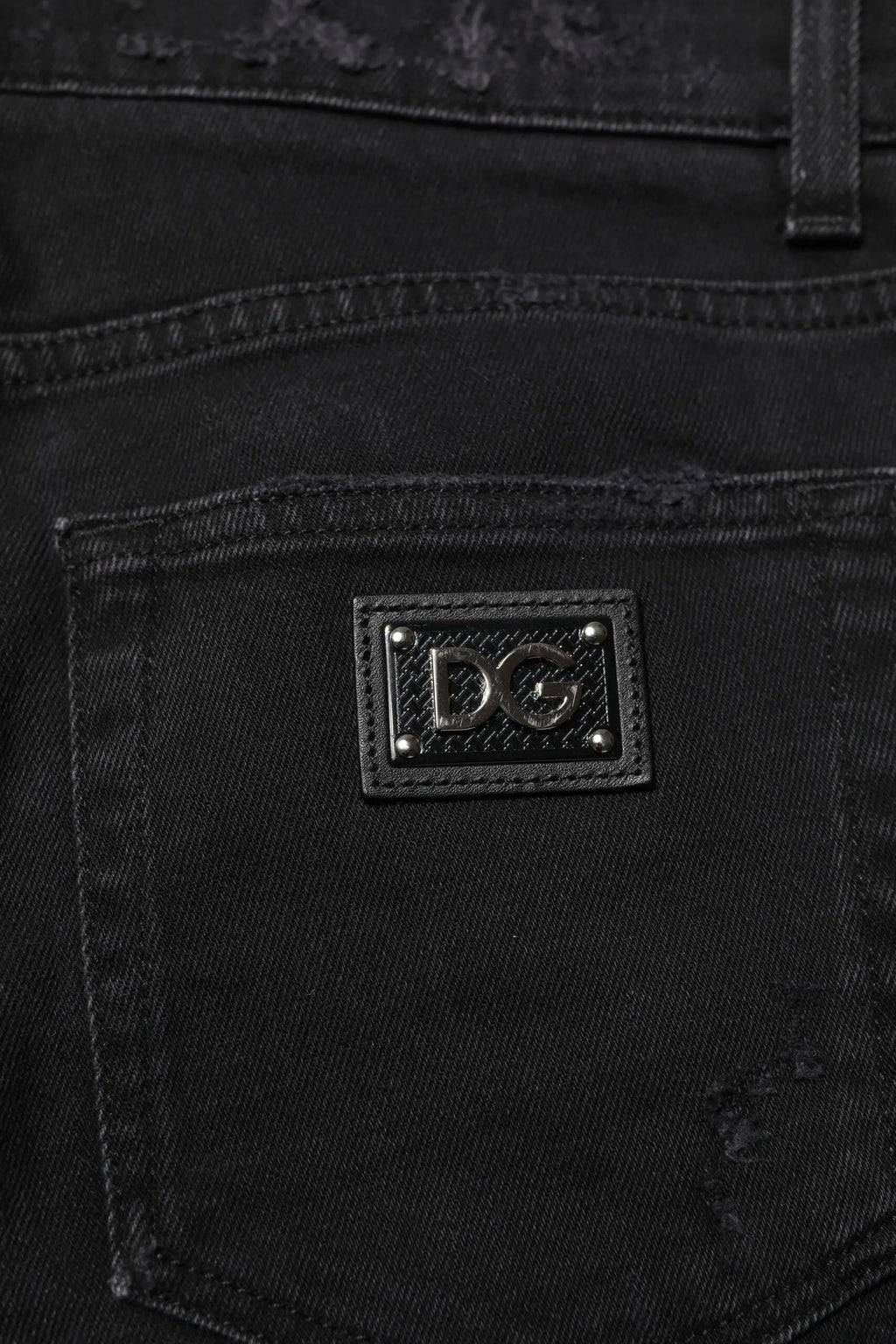 Jeans skinny homme en coton noir dolce gabbana avec patch rectangulaire en cuir noir et logo dg argenté au dos
