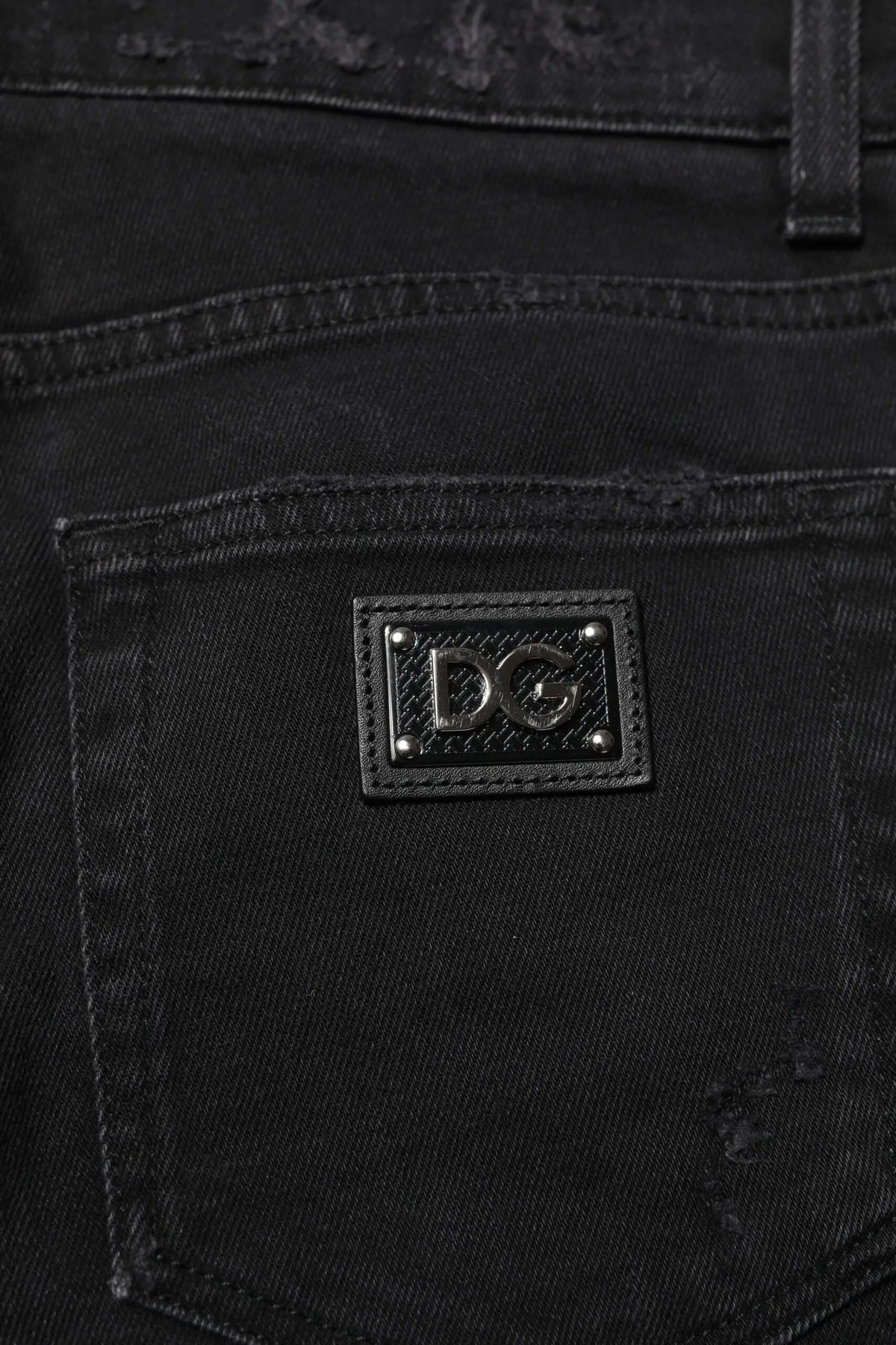 Jeans skinny homme en coton noir dolce gabbana avec patch rectangulaire en cuir noir et logo dg argenté au dos
