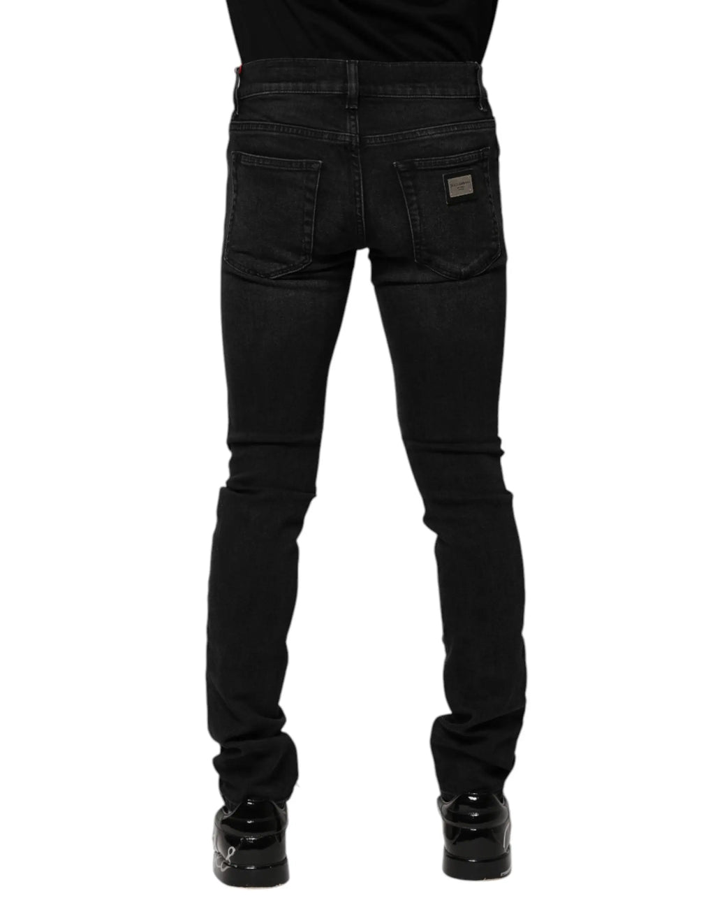 Jean denim skinny homme dolce & gabbana noir en coton slim avec texture délavée subtile vu de dos