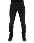 Jeans denim noirs slim fit Dolce & Gabbana en coton avec design cinq poches classique et décoloration subtile aux cuisses