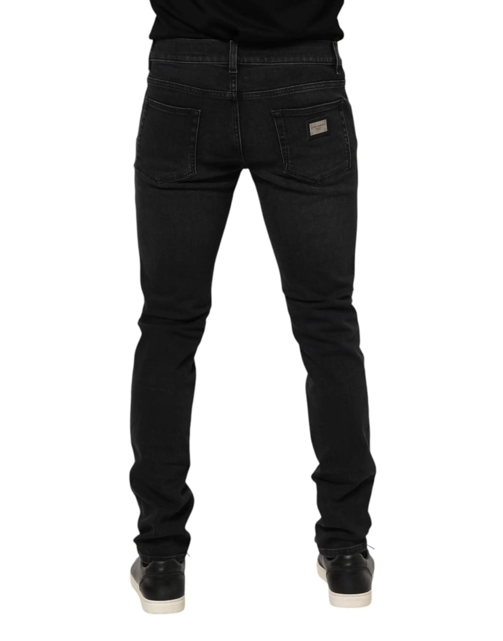Jean slim noir en coton dolce & gabbana pour homme avec texture délavée subtile vu de dos
