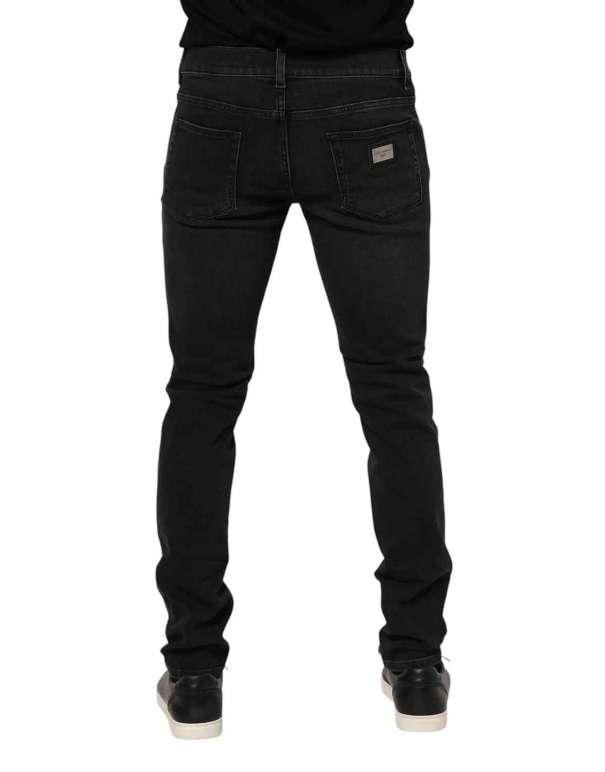 Jean slim noir en coton dolce & gabbana pour homme avec texture délavée subtile vu de dos