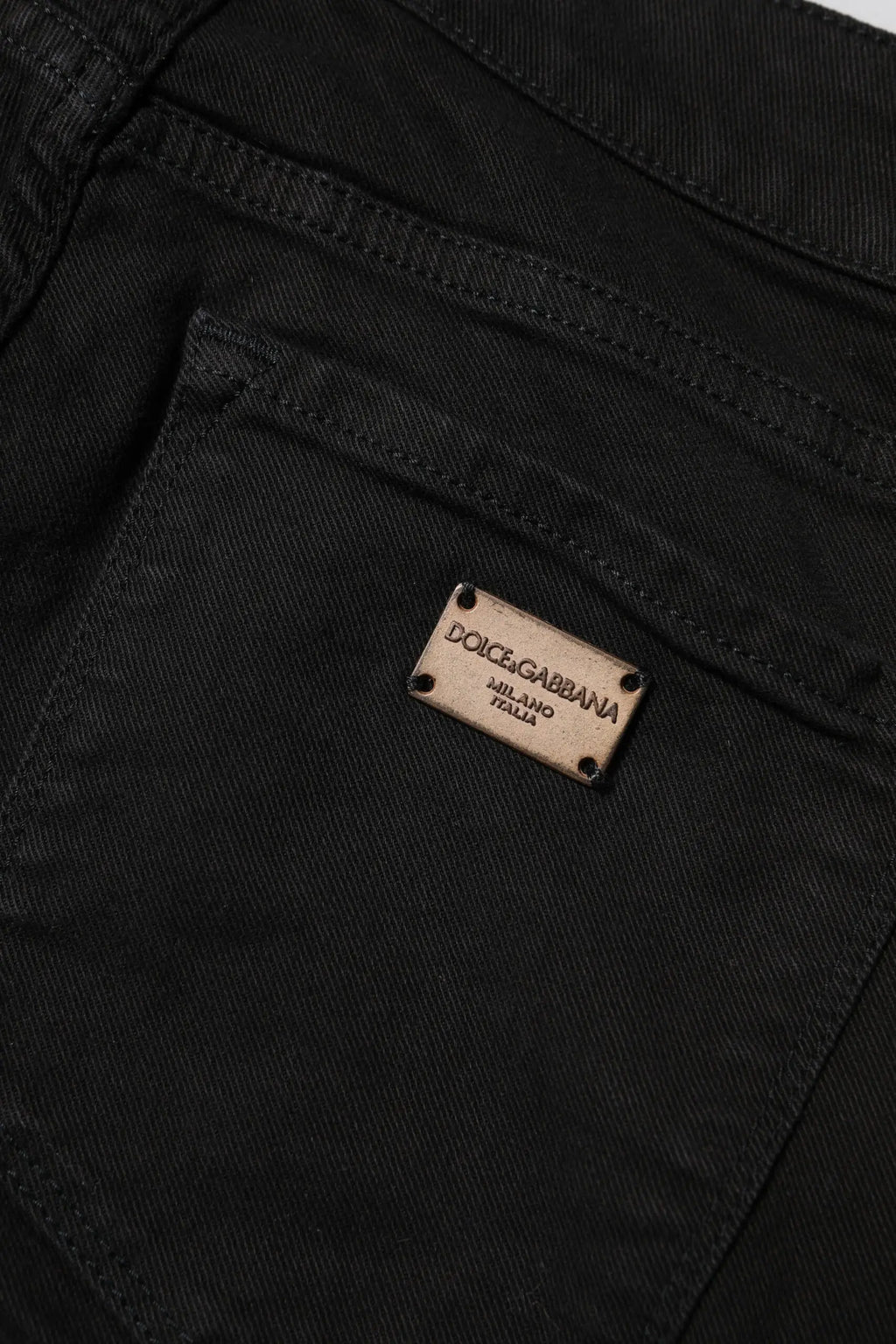 Jean en denim noir dolce gabbana en coton skinny taille moyenne avec étiquette dorée milano italia au dos