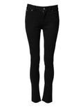 Dolce & gabbana jean en coton noir denim slim avec taille mi-haute et ourlets évasés