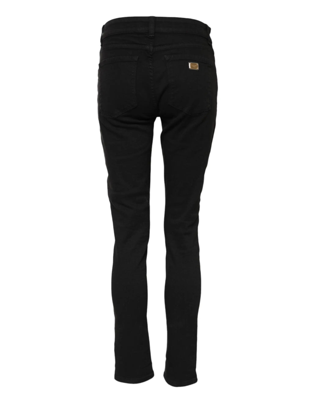 Vue arrière de jeans noire en denim coton slim fit avec patch doré dolce gabanna sur la poche arrière droite