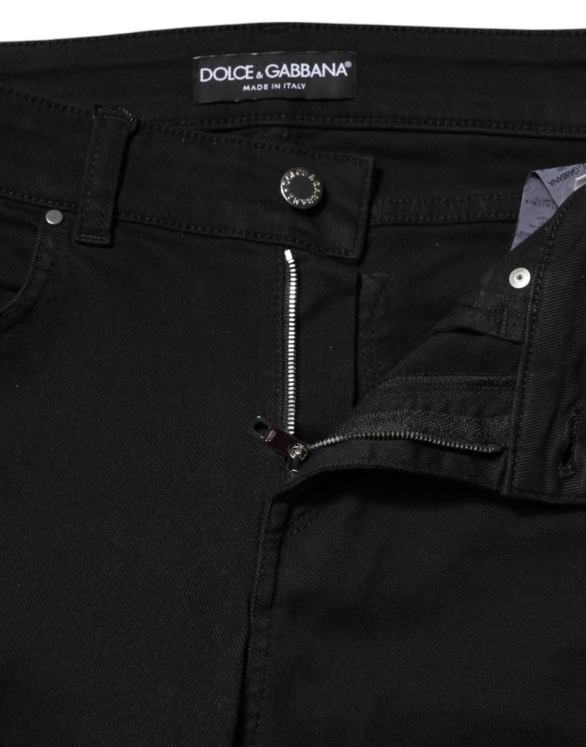 Jeans en denim noir dolce & gabbana skinny taille mid en coton avec fermeture éclair et bouton argentés