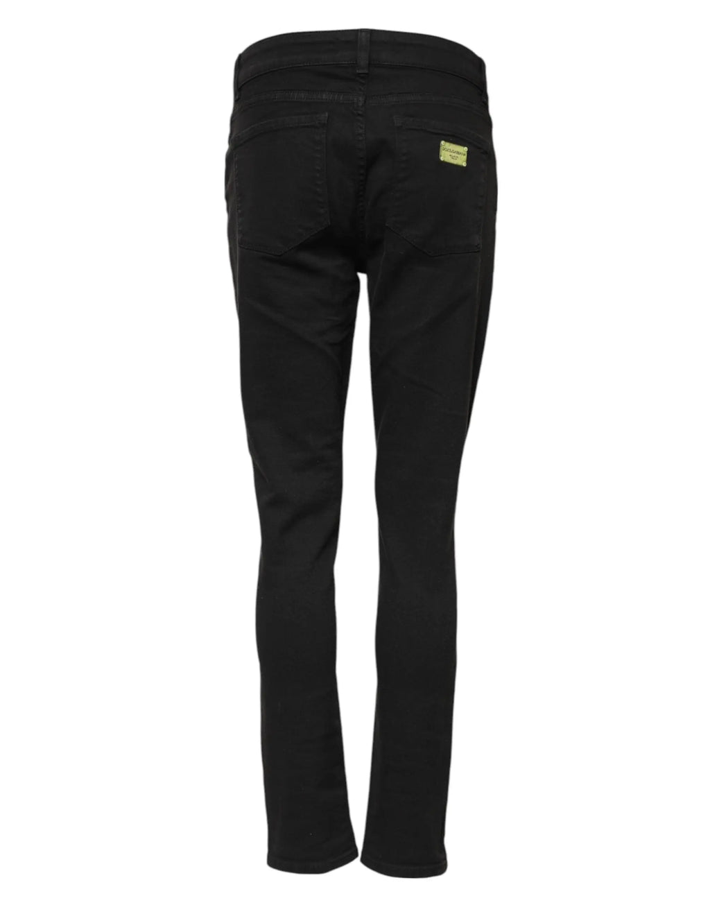 Jeans noir en denim coton slim mid waist de dolce & gabbana vus de dos avec petite étiquette jaune sur la poche arrière