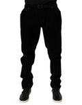 Pantalon slim en denim coton noir dolce amp gabbana avec fines côtes verticales porté avec baskets noires