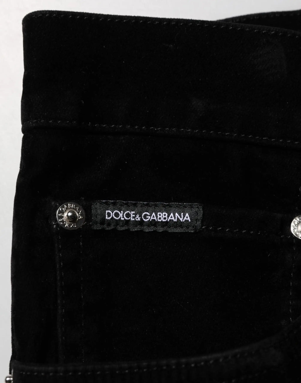 Pantalon slim en denim noir dolce & gabbana en coton avec étiquette de marque en daim noir visible