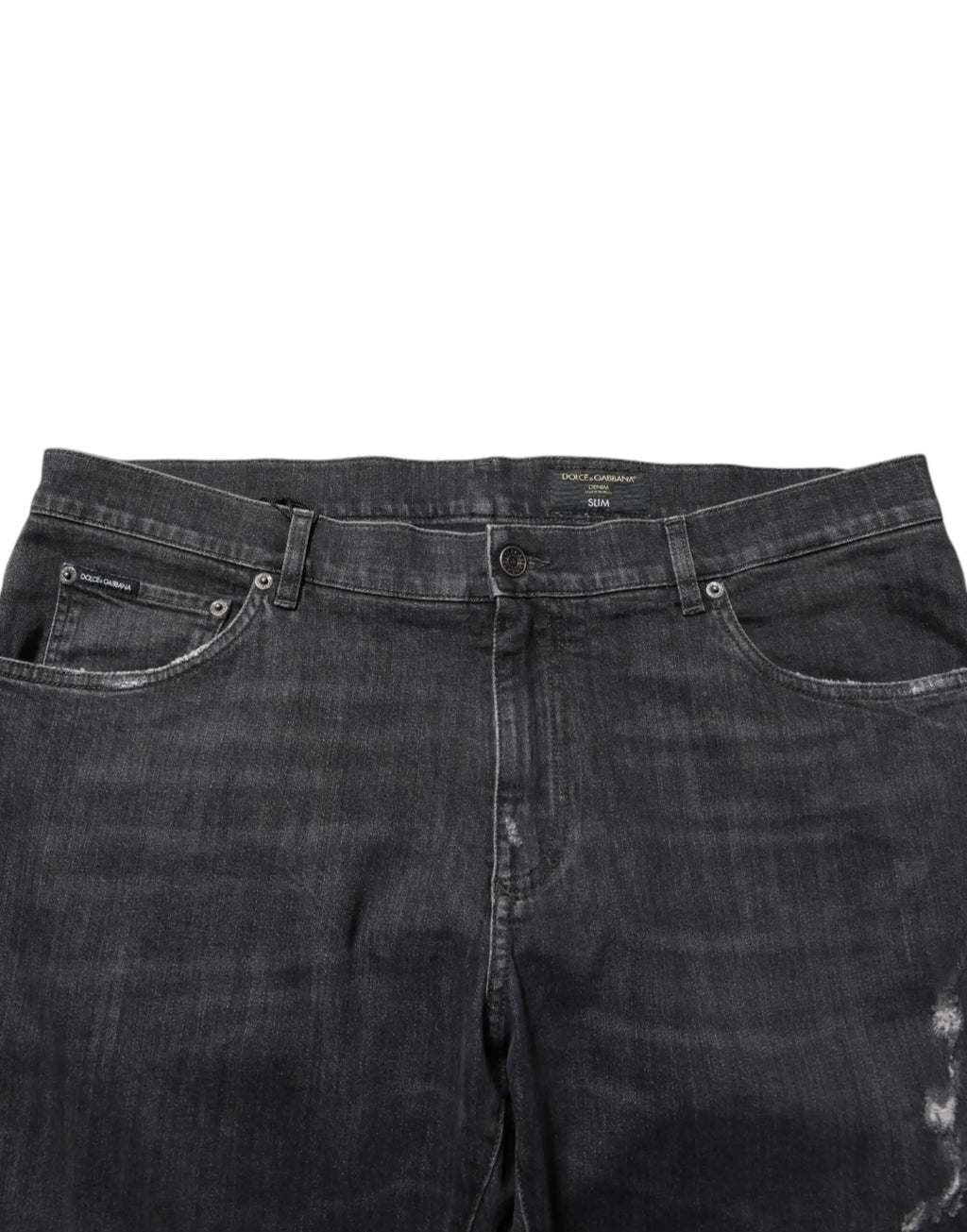 Jean noir en coton slim fit dolce gabbana avec finition délavée et déchirée et étiquette de marque sur la ceinture