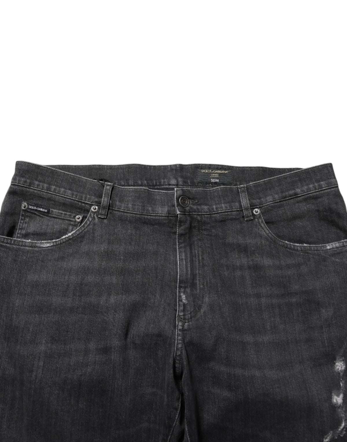 Jean noir en coton slim fit dolce gabbana avec finition délavée et déchirée et étiquette de marque sur la ceinture