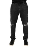 Jean noir en coton dolce & gabbana slim fit avec déchirures aux genoux et coupe droite