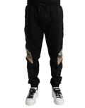 Dolce & gabbana pantalon jogger slim stretch en coton noir avec panneaux imprimé léopard aux cuisses extérieures