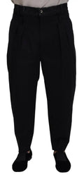 Dolce & gabbana pantalon ample en denim noir stretch en coton avec plis et fermeture par bouton à la taille