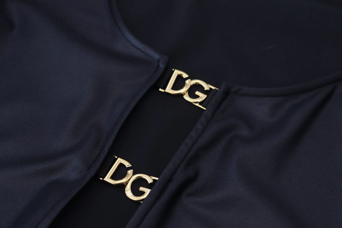 Ceinture noire dolce & gabbana en coton stretch avec boucle logo dg dorée assortie au top noir à manches 3 4 ouvertes