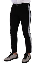 Jean noir slim fit dolce & gabbana en coton stretch avec rayure blanche verticale en velours côtelé