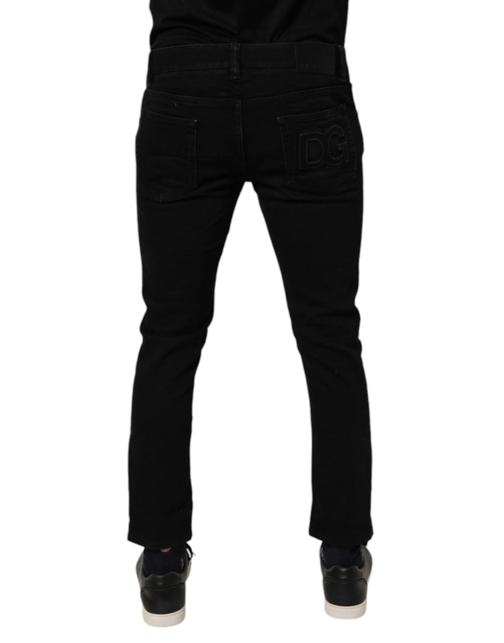 Jeans slim en denim noir dolce & gabbana coton stretch vue arrière avec logo dc embossé sur la poche arrière