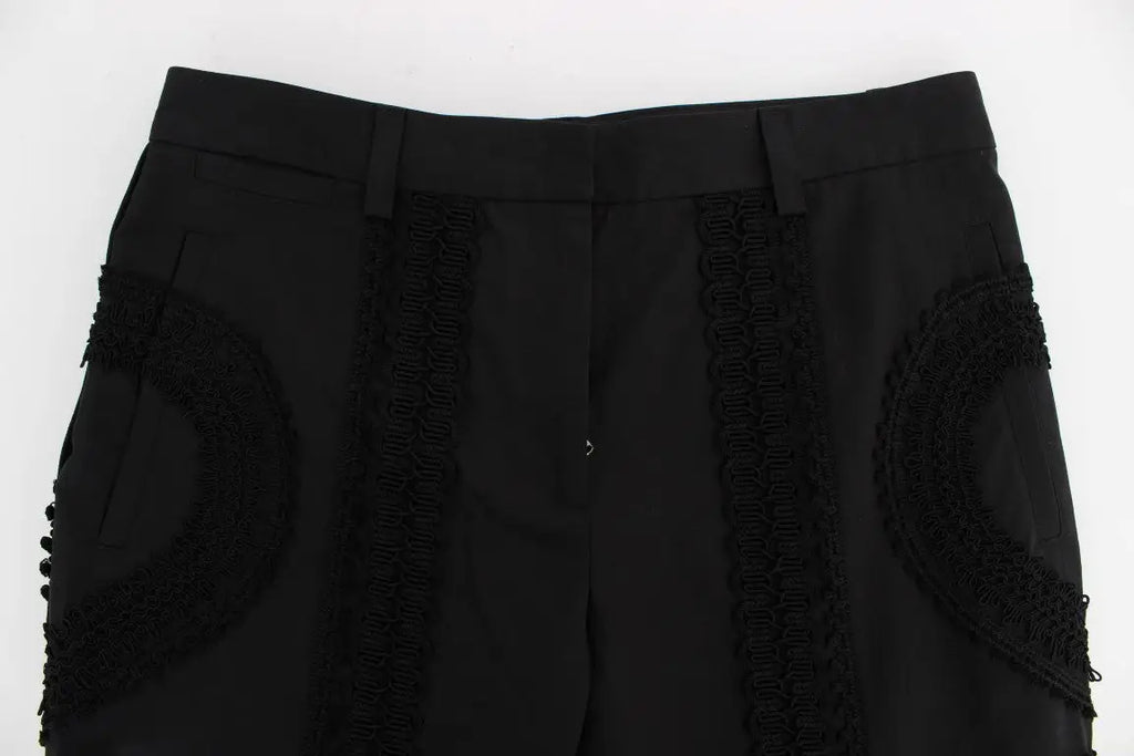 Pantalon capri torero dolce & gabbana noir en coton stretch avec applications en dentelle noire sur les côtés et poches