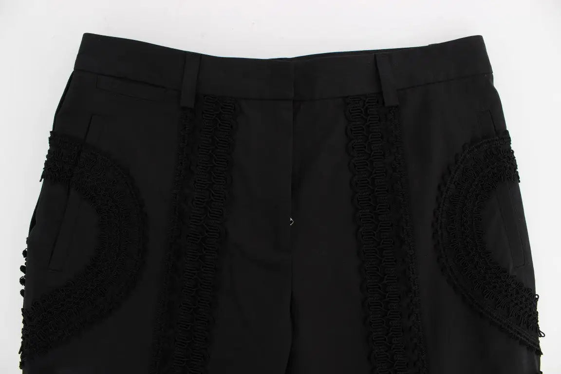 Pantalon capri torero dolce & gabbana noir en coton stretch avec applications en dentelle noire sur les côtés et poches