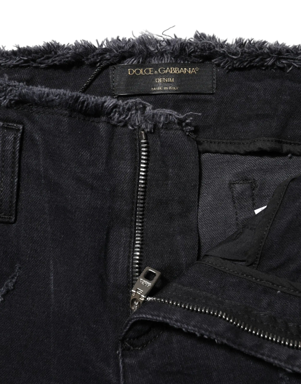 Jean skinny en denim noir déchiré dolce & gabbana avec bordure en fausse fourrure grise foncée et fermeture éclair argentée