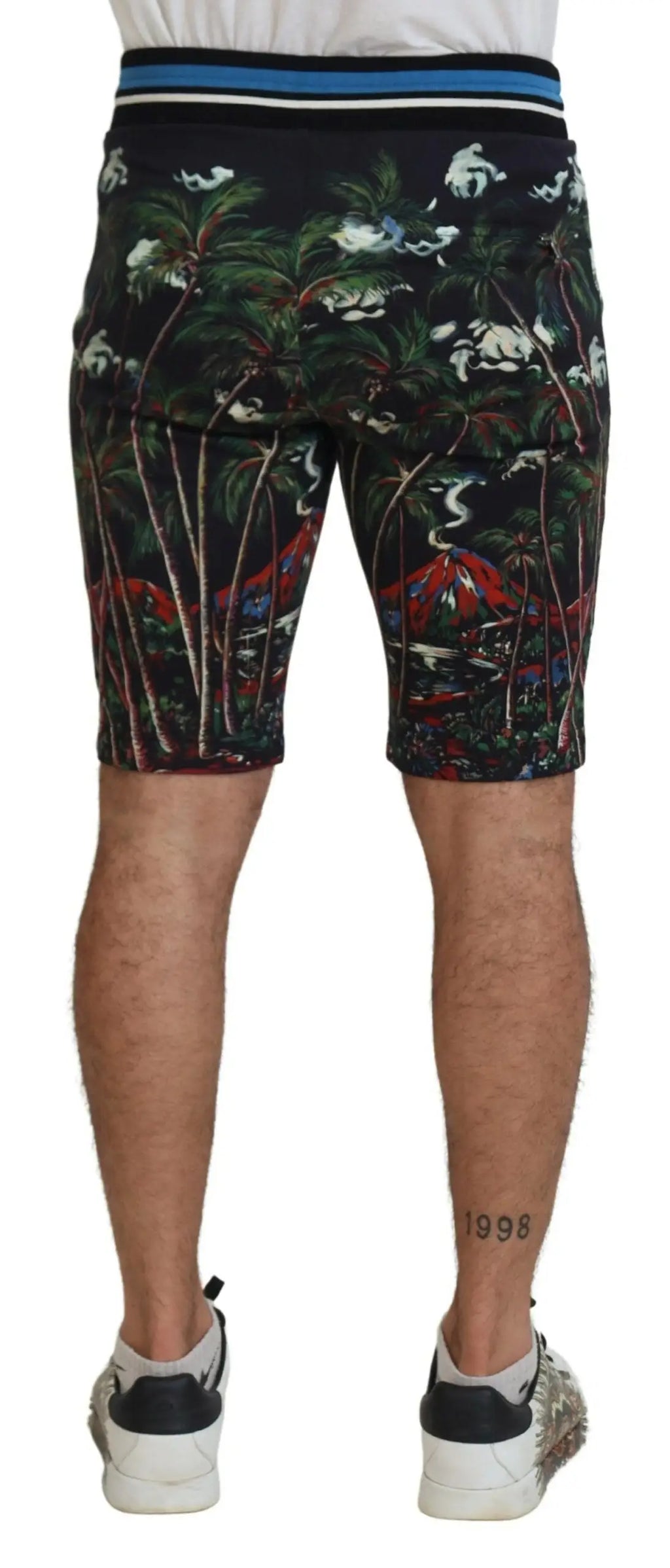 Shorts noirs en coton dolce gabbana à imprimé volcan tropical avec palmiers oiseaux feuillage rouge et ceinture rayée
