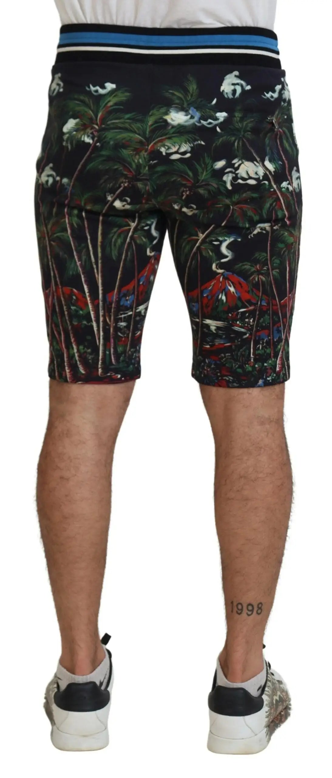 Shorts noirs en coton dolce gabbana à imprimé volcan tropical avec palmiers oiseaux feuillage rouge et ceinture rayée