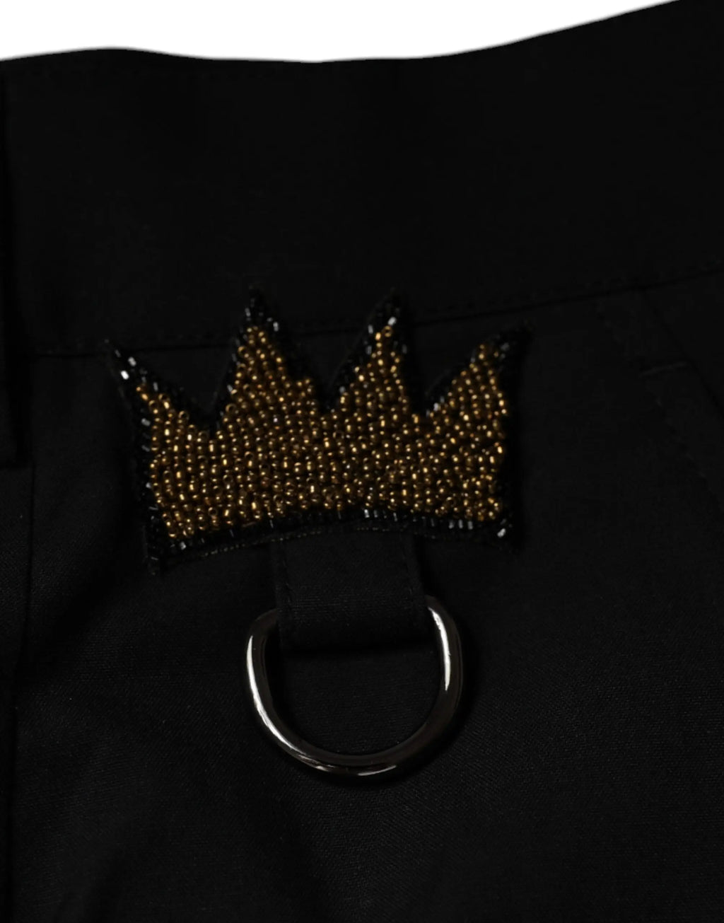 Pantalon en coton noir dolce & gabbana avec patch couronne dorée perlée et anneau métallique argenté