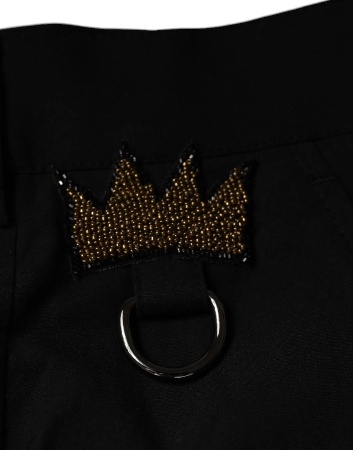 Pantalon en coton noir dolce & gabbana avec patch couronne dorée perlée et anneau métallique argenté