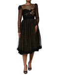 Robe noire dolce & gabbana en dentelle avec broderie dorée et manches en tulle transparent ornée de cristaux