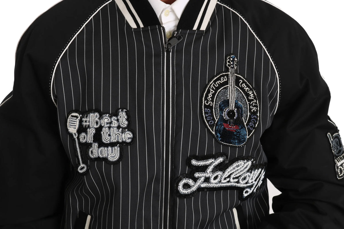 Dolce & gabbana noir veste bomber à rayures fines avec patchs brodés blancs micro guitare et texte cursif