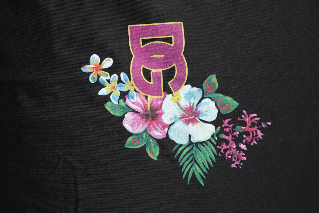 Dolce & gabbana t shirt noir en coton avec imprimé floral vibrant et logo dg violet bordé d or