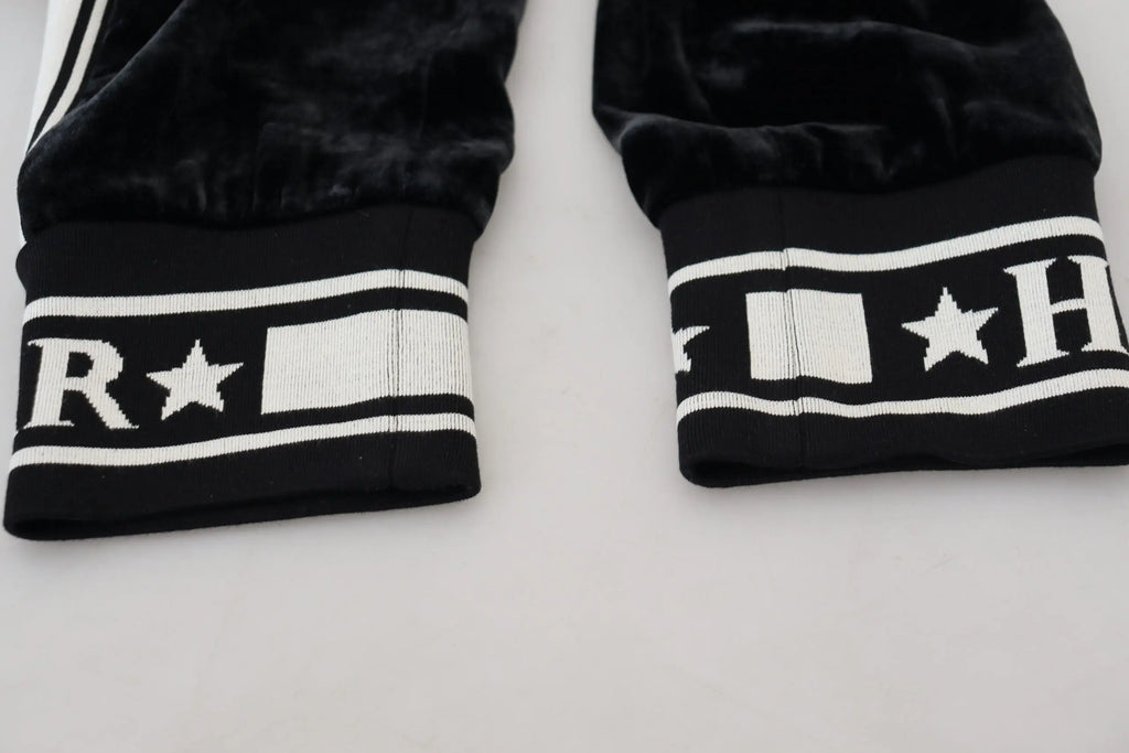 Dolce & gabbana black velvet joggers with white striped cuffs and bold r star h logo design