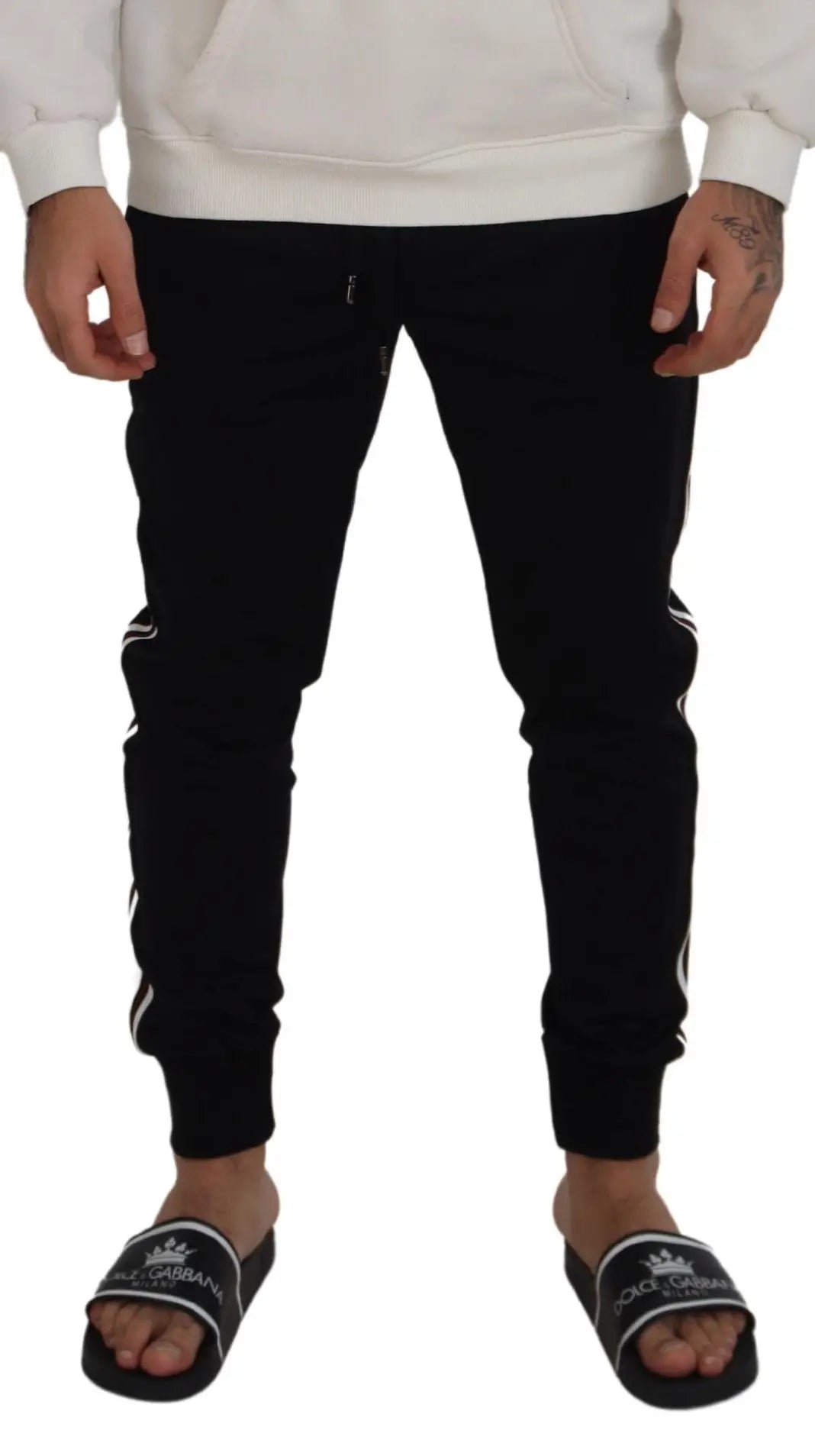 Pantalon de jogging homme dolce & gabbana noir avec bandes latérales blanches logo discret taille élastique et poignets côtelés