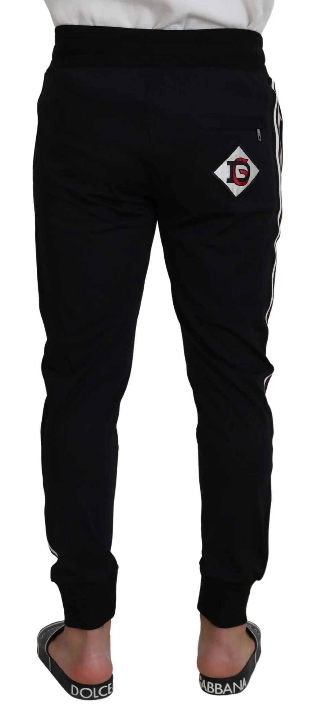 Joggers noirs dolce & gabbana pour homme avec rayures blanches latérales et patch logo en forme de diamant au dos