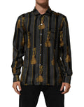 Chemise noire à manches longues dolce & gabbana en soie avec motifs de pois dorés et pampilles tassel