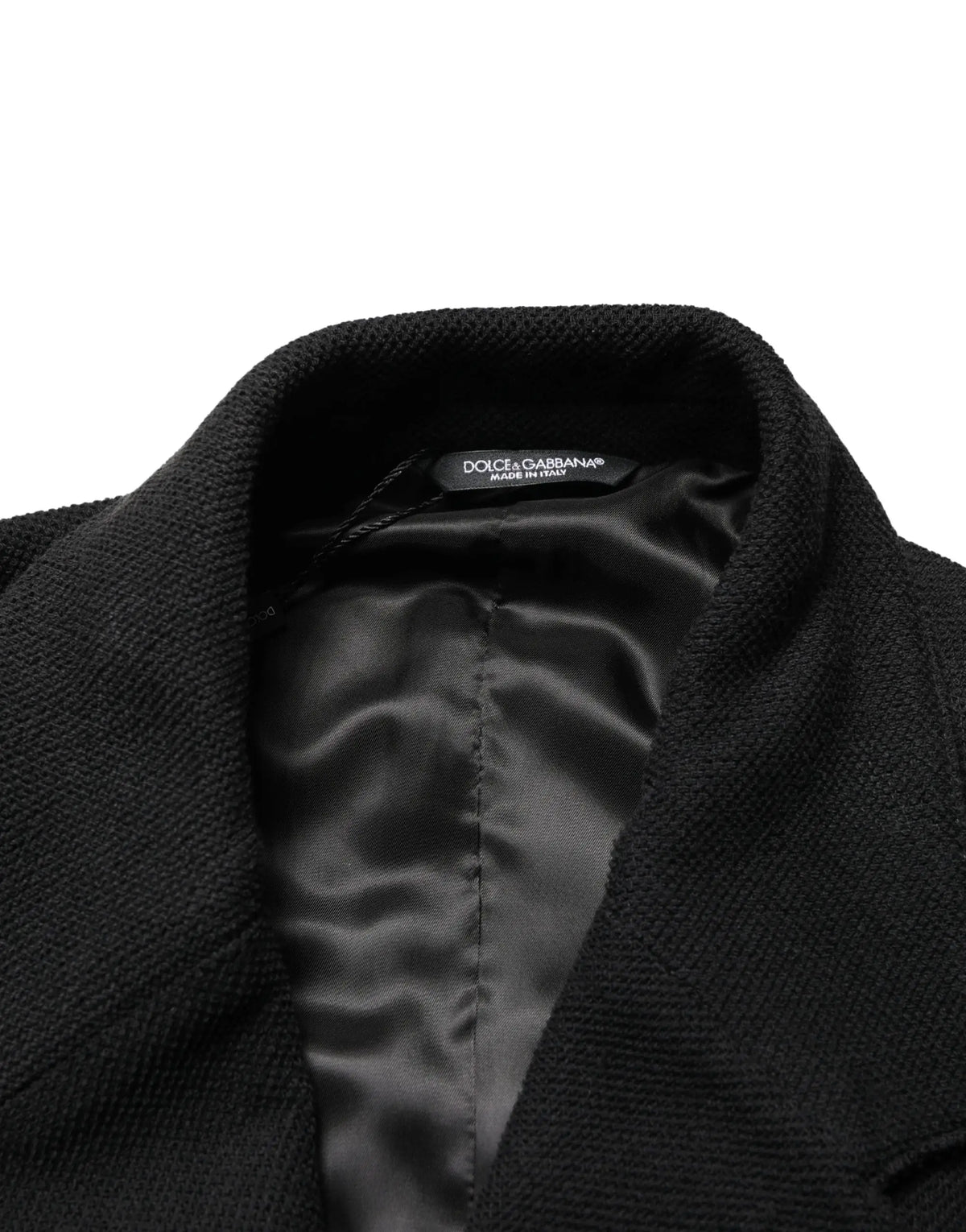 Dolce & gabbana manteau noir à double boutonnage avec extérieur en maille texturée et intérieur doublé satin