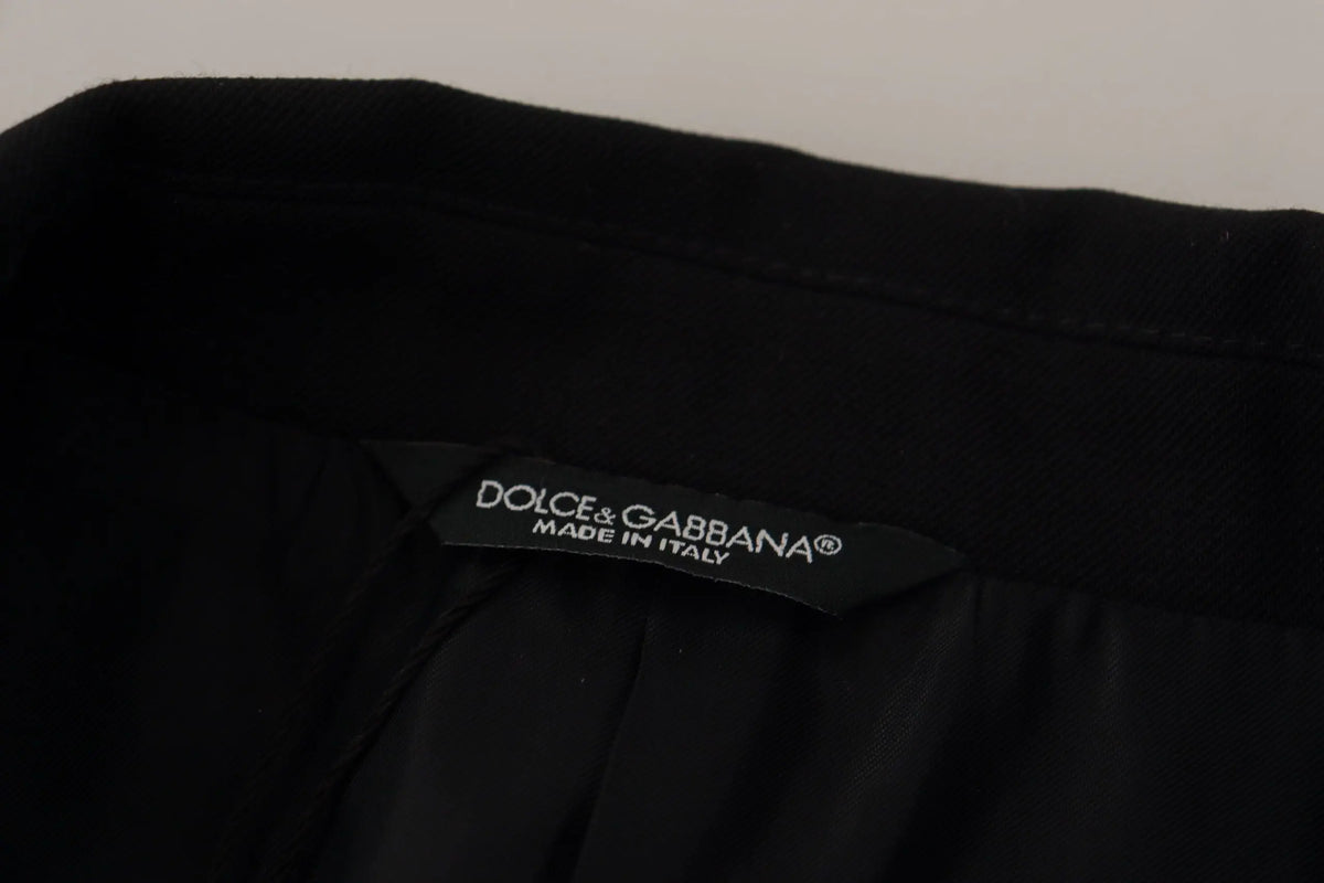 Étiquette noire dolce & gabbana avec texte blanc made in italy sur manteau blazer noir croisé en laine