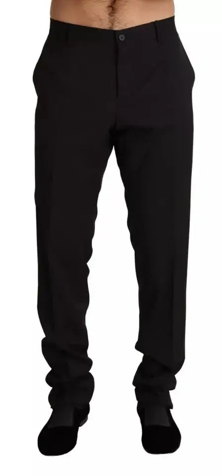 Pantalon noir formel dolce & gabbana en coupe skinny avec pli subtil sur le devant et jambe droite élégante