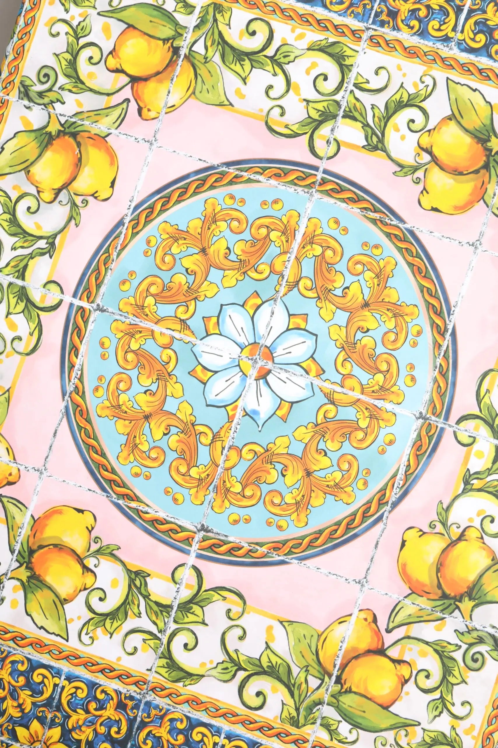 Vibrant ceramic tile with light blue medallion gold floral design pink white borders yellow lemons for dolce gabbana leather sicily dolls