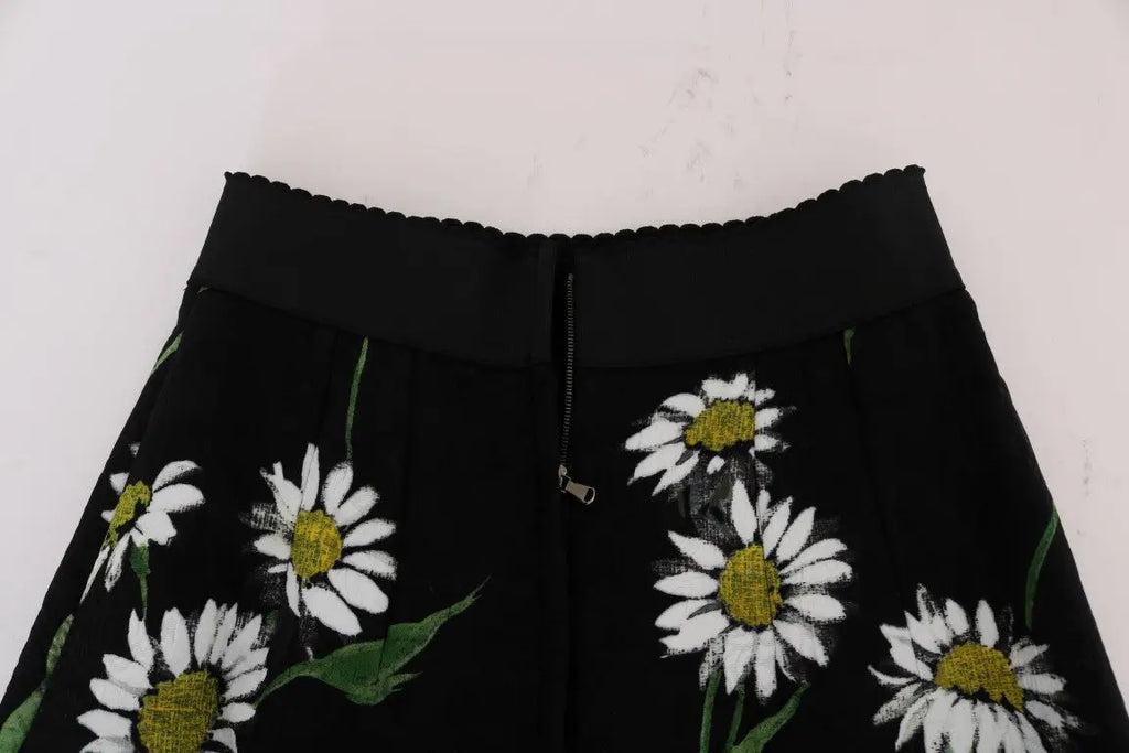 Jupe taille haute noire dolce gabbana en brocart avec imprimé marguerites blanches et centres jaunes avec tiges vertes
