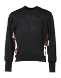 Dolce & gabbana pull crewneck noir avec imprimé graphique délavé et panneaux floraux brodés sur les manches