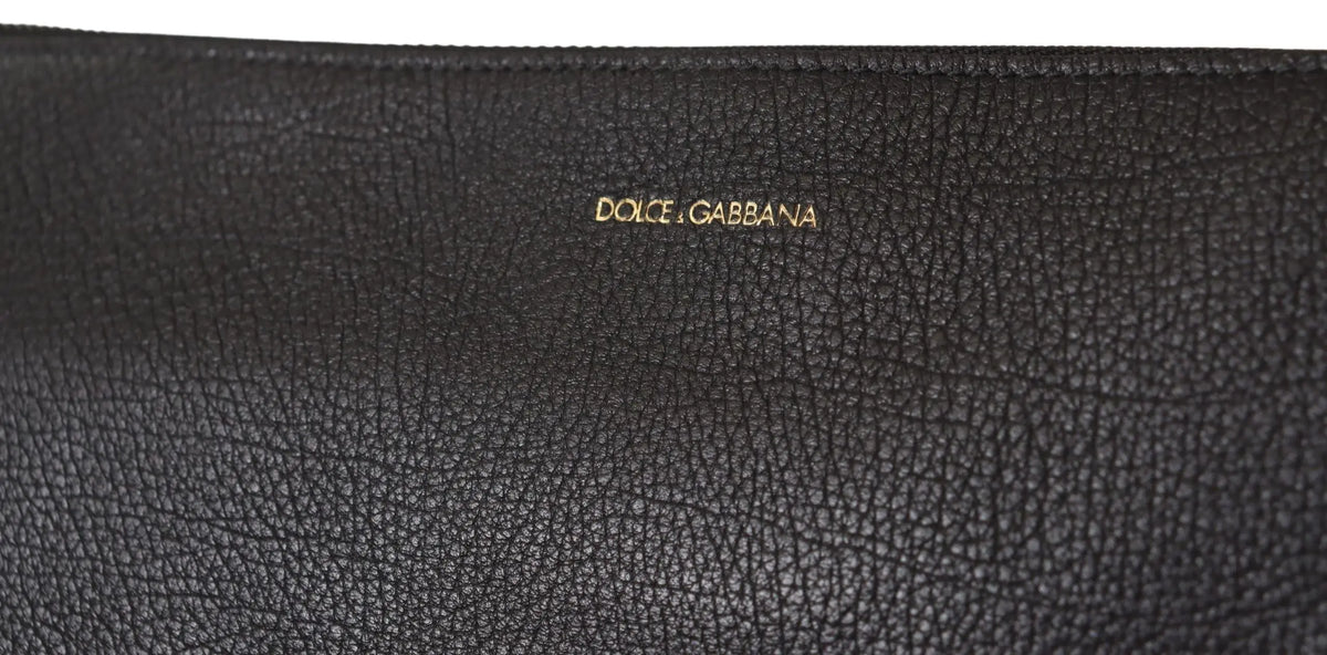 Pochette noire en cuir texturé dolce gabbana avec logo doré sac bandoulière en cuir exotique alta sartoria
